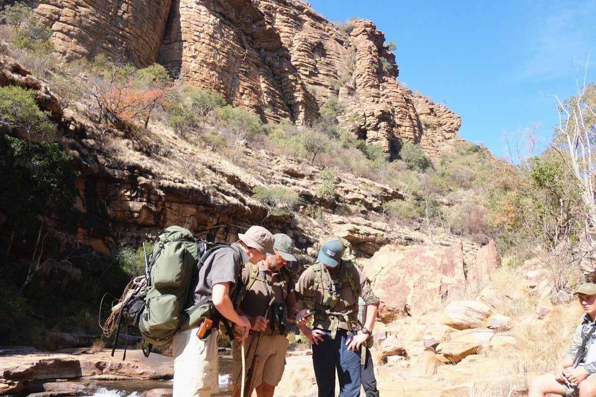 Reading the route in a sandstone gorge